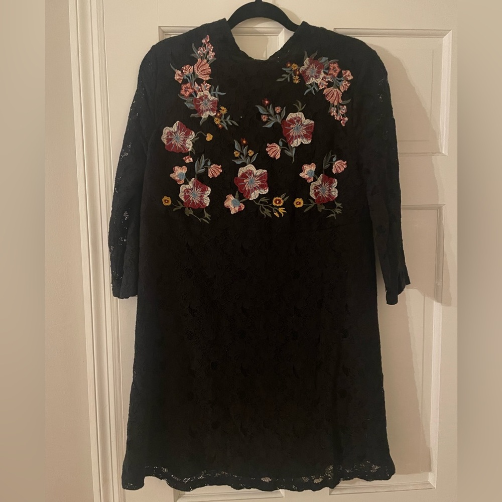 Boutique dress with floral embroidery. Worn once for a wedding
